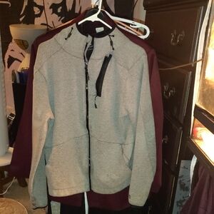Champion grey jacket with brown on the inside